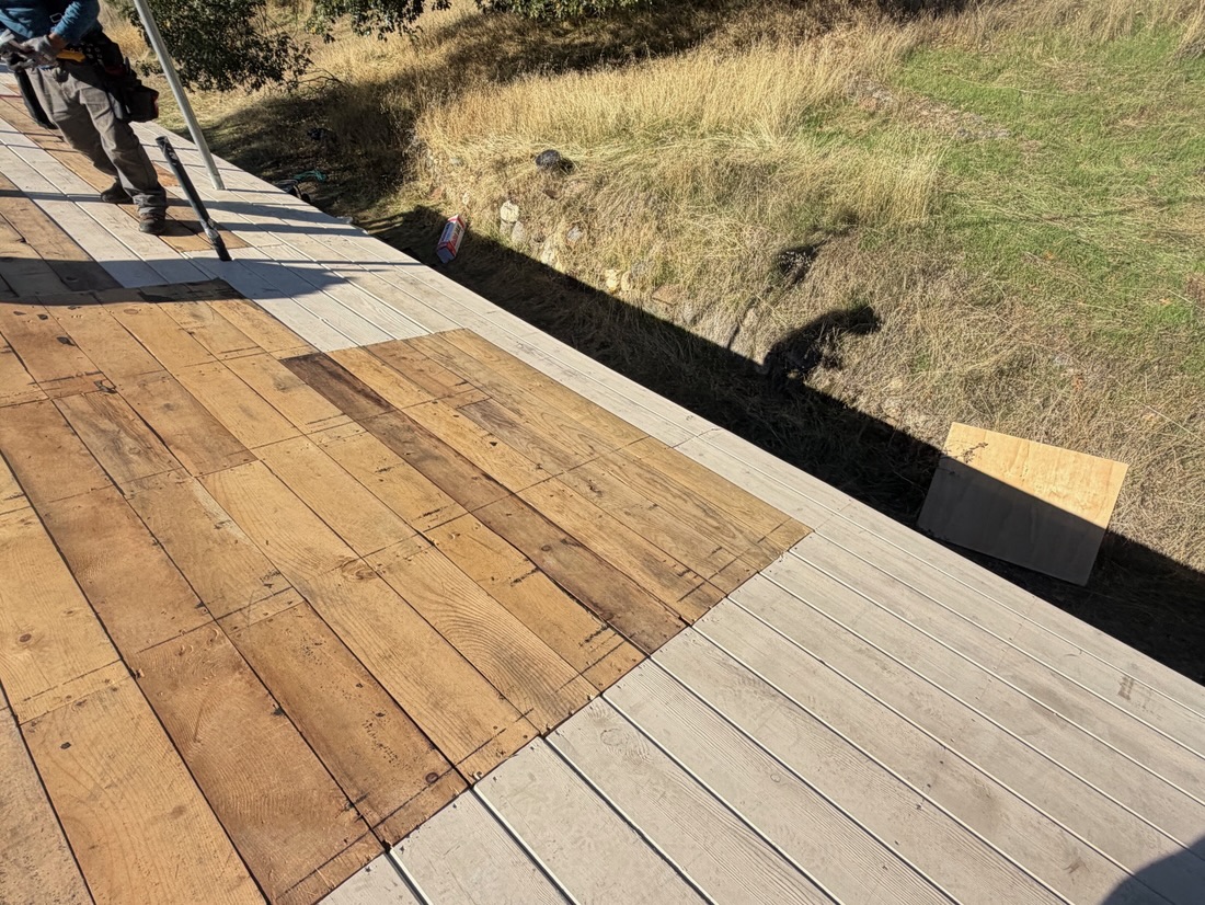 Fresh roof decking installed during a repair