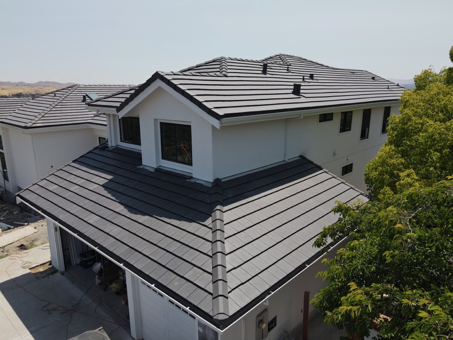 Flat concrete tile roof on a new two-story home