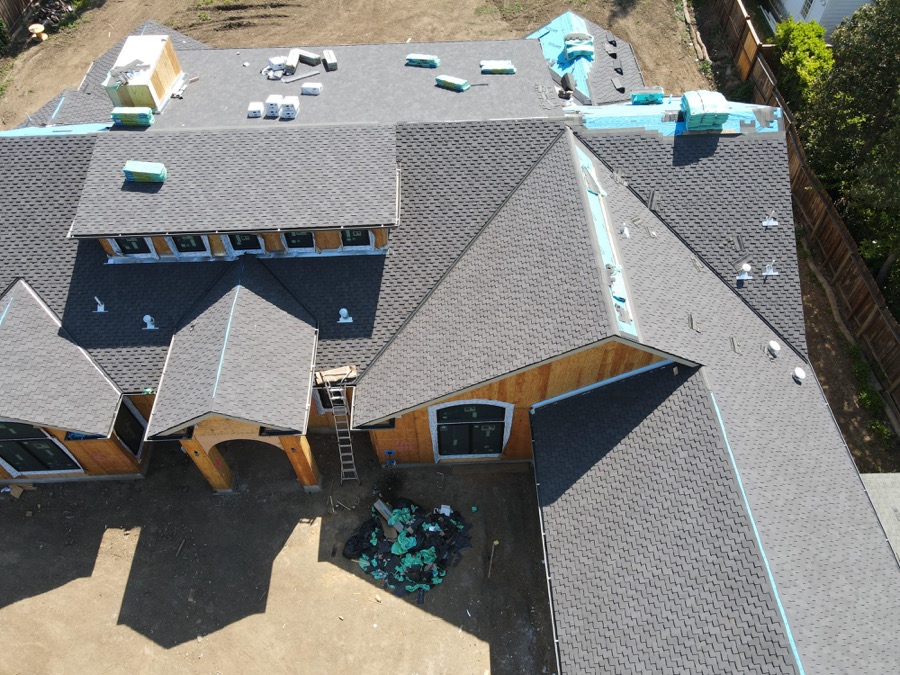 Aerial view of a full roof on a new custom home