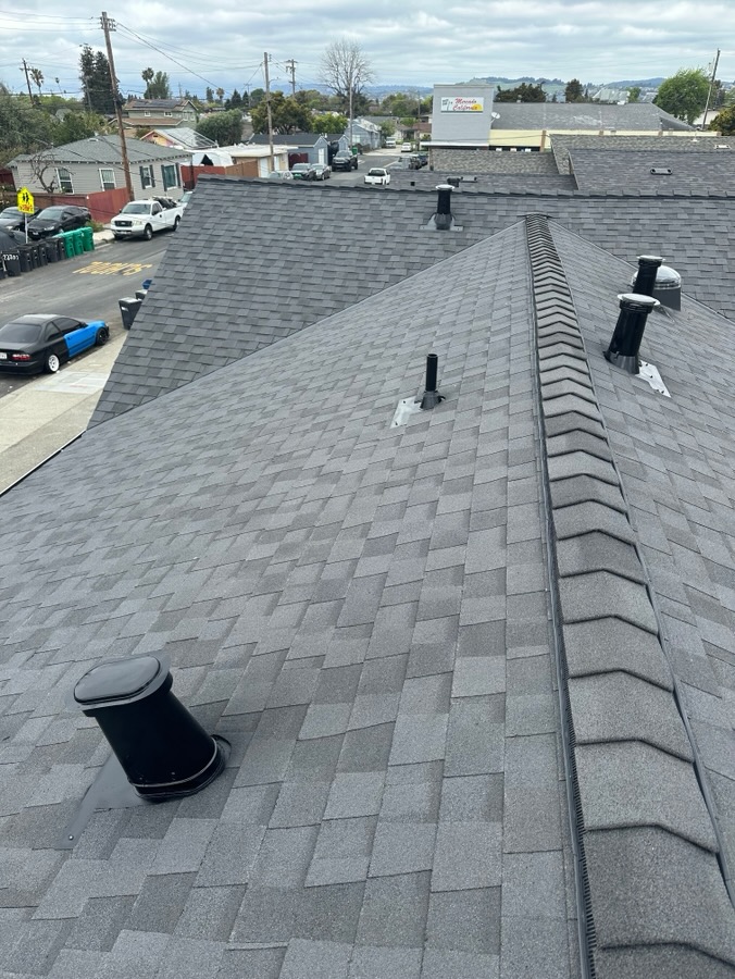 Roof vents and ridge on a new shingle roof